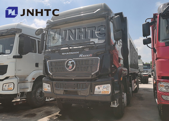 모래는 30명의 톤 덤프차 샤크만 H3000 8x4 12 Wheeler를 옮깁니다