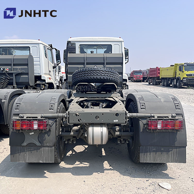 HOWO NX 10 바퀴 380hp 반 트랙터 트럭 머리 디젤 연료 수동 변속기 오른쪽 유로 2 빠른 저렴한 가격 판매